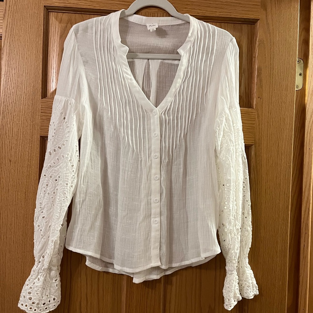 White blouse with detailed sleeves